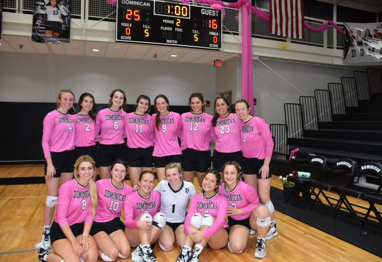 Dominican's Varsity Volleyball Team after their win over Mt. Carmel in the Paint the Pitt Pink Game.