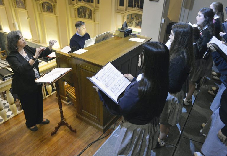 Led by Brenda Castillo, Dominican's Choir performs at Notre Dame Seminary Chapel.